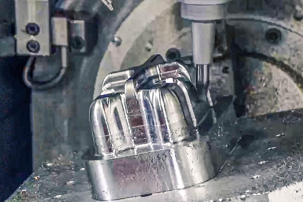 5-axis finishes of workpiece sides with the OptiMill-3D-CS shoulder radius milling cutter.