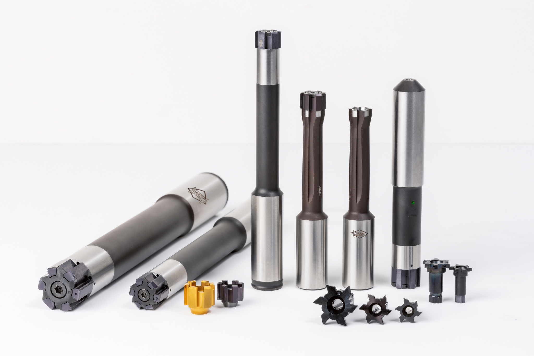 The picture shows a representative selection of holders and exchangeable heads from the MAPAL Press-to-Size-Reamer range.